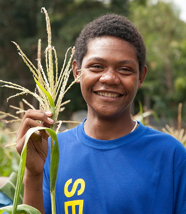 Young man at City Mission Farm, Papua New Guinea, learning vocational skills. Credit: DFAT, Ness Kerton/AusAID